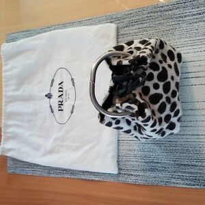 Prada mini bucket purse with ring handle